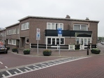 Hoek Oranjestraat/Hogeweg.
              <br/>
              Bas van Roijen, 201-02-11